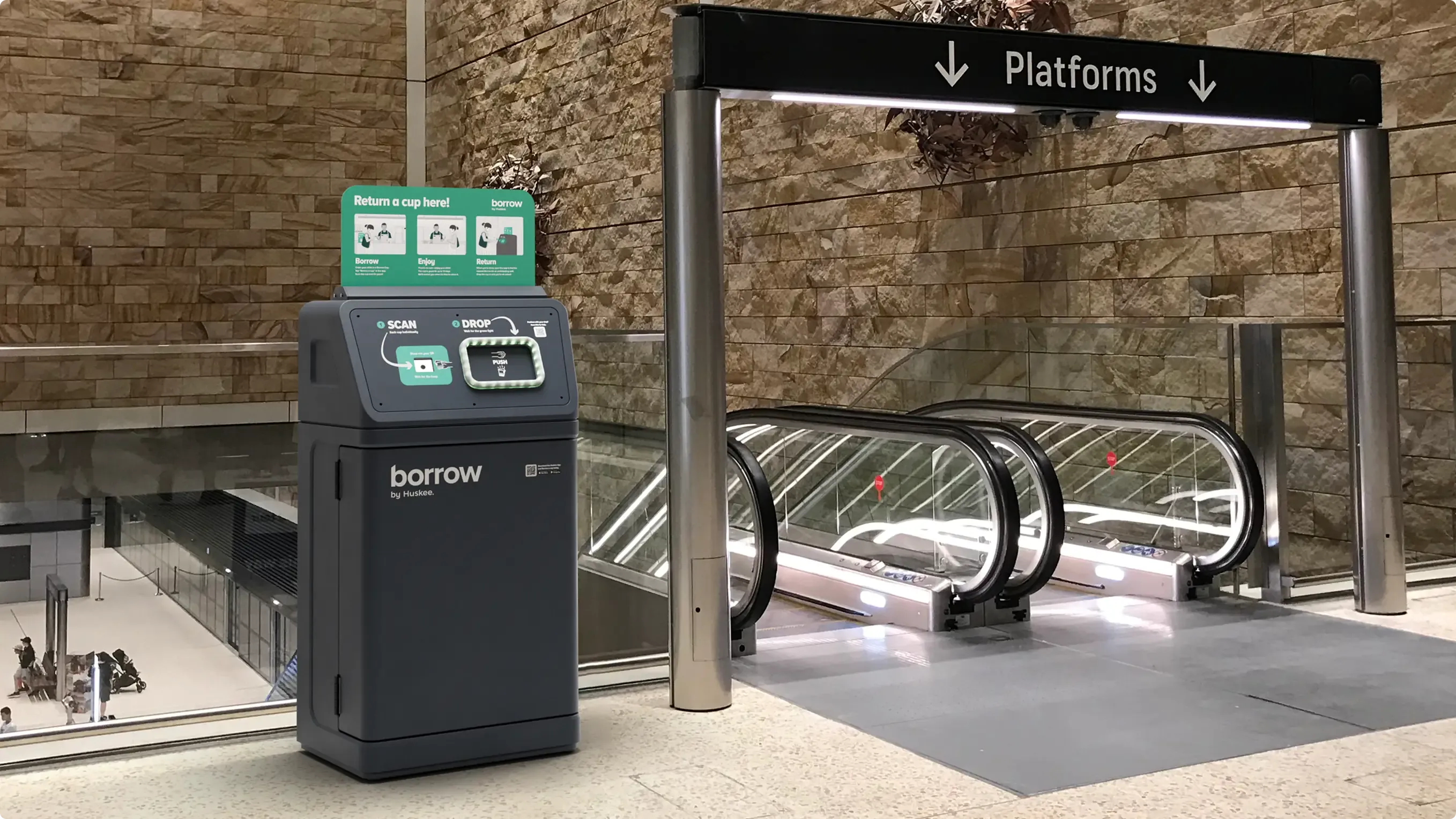 A Borrow bin at the head of the escalators down to a station's platforms